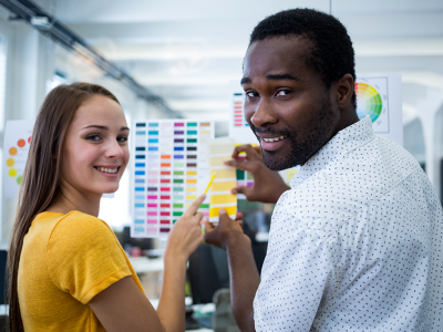 luxor-male-female-graphic-designers-interacting-color-chart